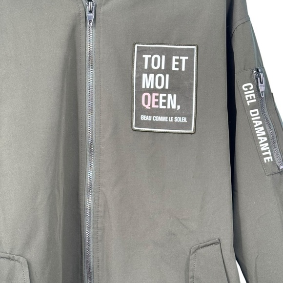 Green Raincoat with Stand-Up Collar and Zipper Closure - Picture 2 of 13